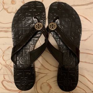Tory Burch “Thora Patent Leather Thong”